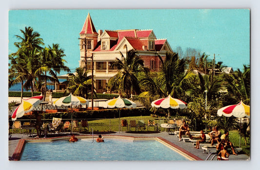 Key West Florida Harris Mansion pool palm trees umbrellas 1960s postcard
