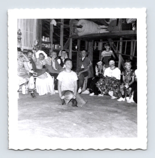 Halloween 1950s children costume party group indoor snapshot barn setting masks face paint vintage photo