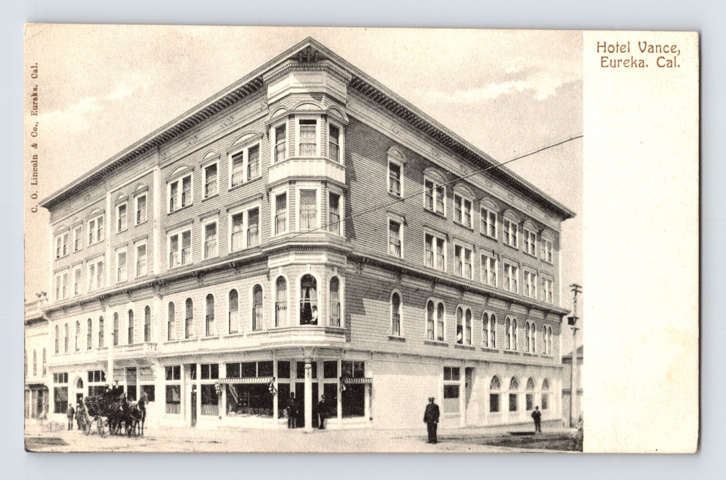 Sepia view of Hotel Vance corner building with arched storefront windows in Eureka California early 1900s postcard