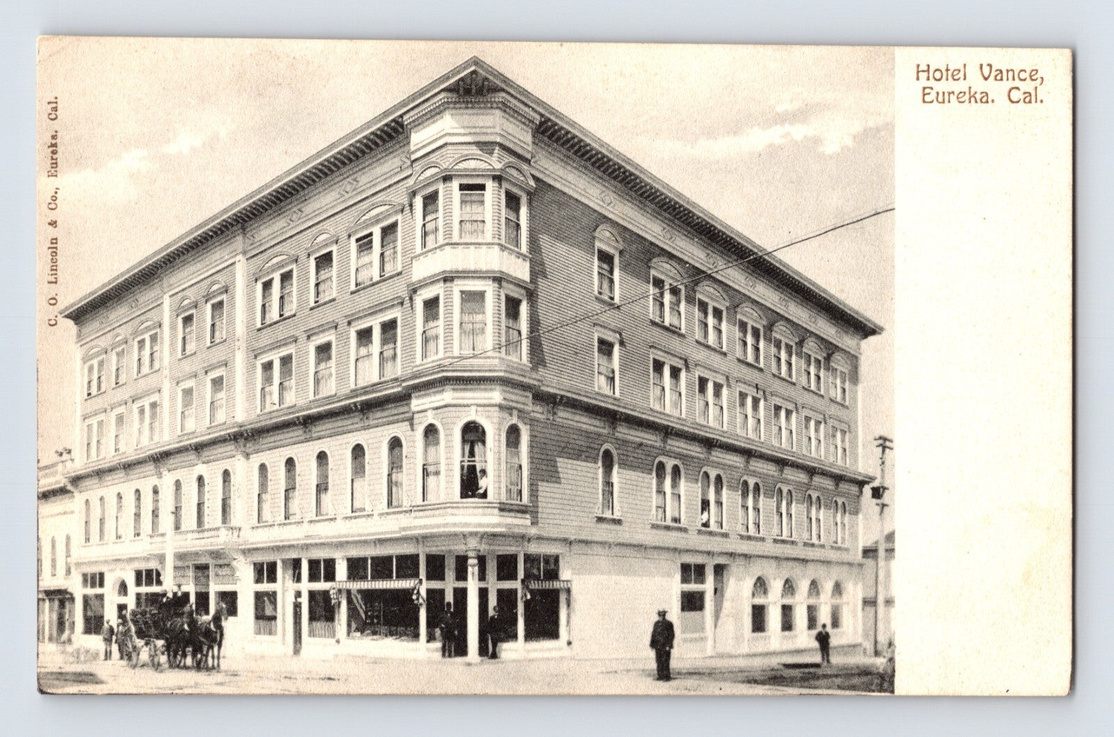 Sepia view of Hotel Vance corner building with arched storefront windows in Eureka California early 1900s postcard