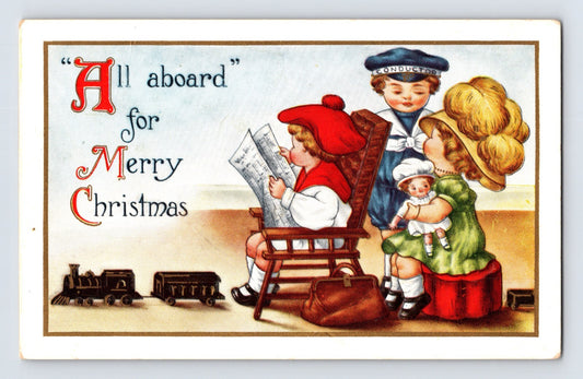 Christmas postcard children toy train conductor doll scene All aboard for Merry Christmas 1910s