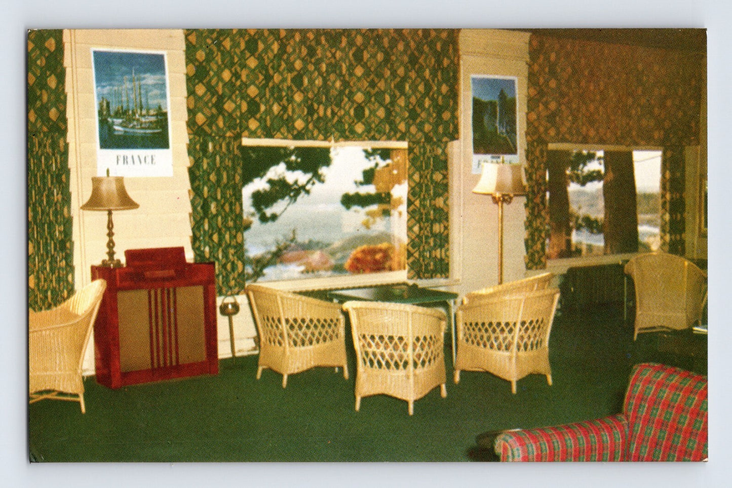 Carmel California Highland Inn hotel lobby 1950s postcard with wicker chairs patterned wallpaper and ocean view windows