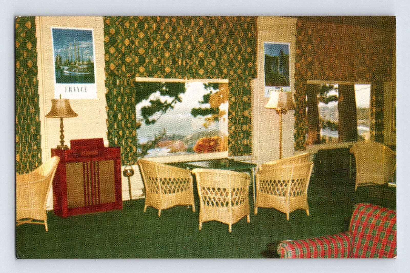 Carmel California Highland Inn hotel lobby 1950s postcard with wicker chairs patterned wallpaper and ocean view windows