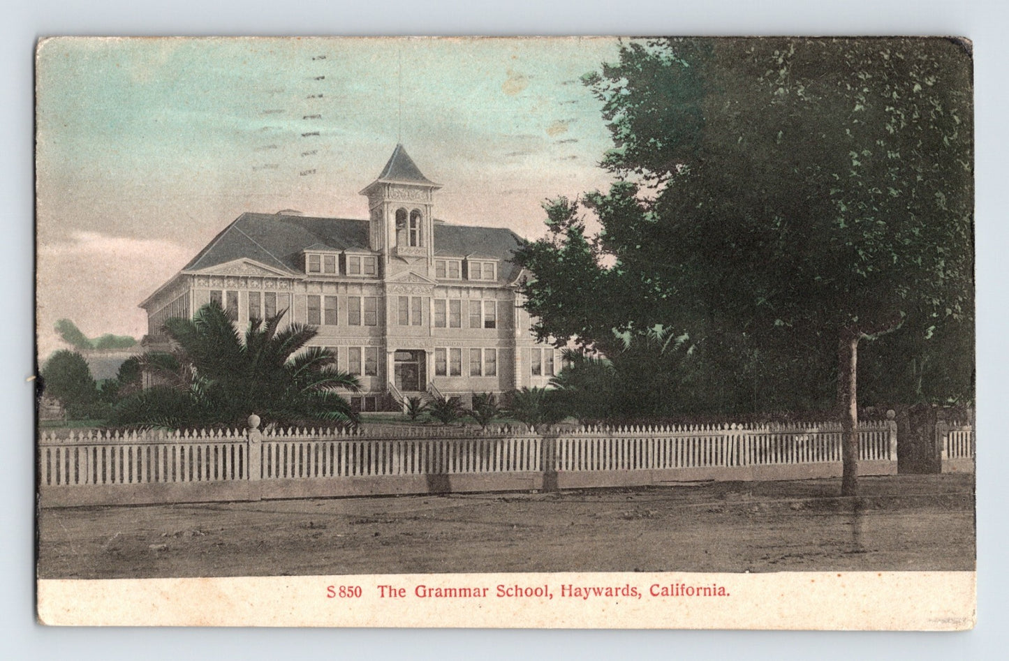 Hayward California Grammar School building with cupola and white fence 1910 posted divided back postcard