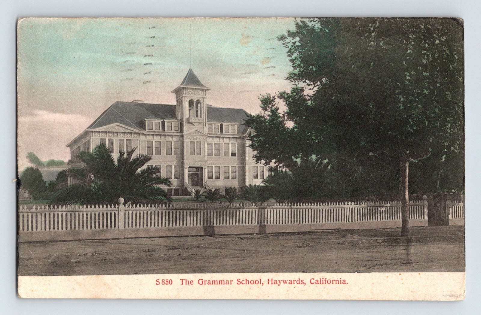 Hayward California Grammar School building with cupola and white fence 1910 posted divided back postcard