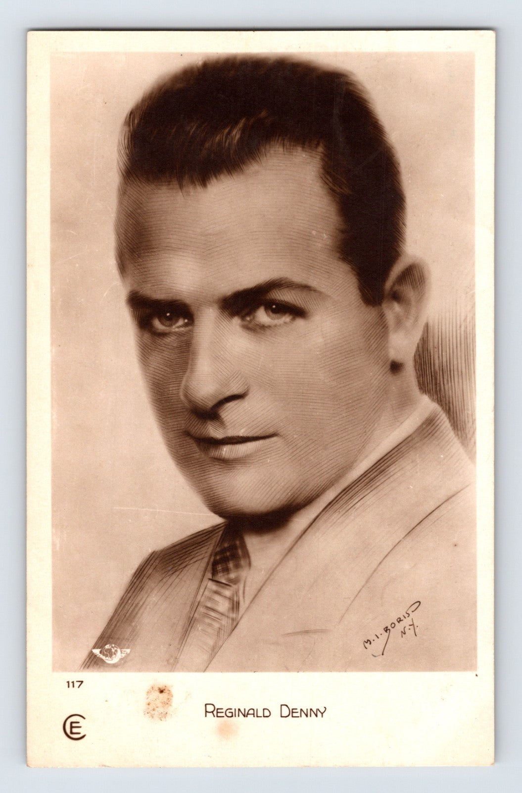 Reginald Denny portrait 1930s silent film star RPPC postcard sepia studio image
