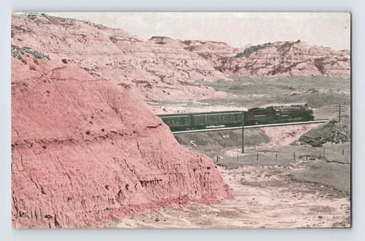 Badlands North Dakota Northern Pacific Coast Limited train 1910s railroad landscape postcard