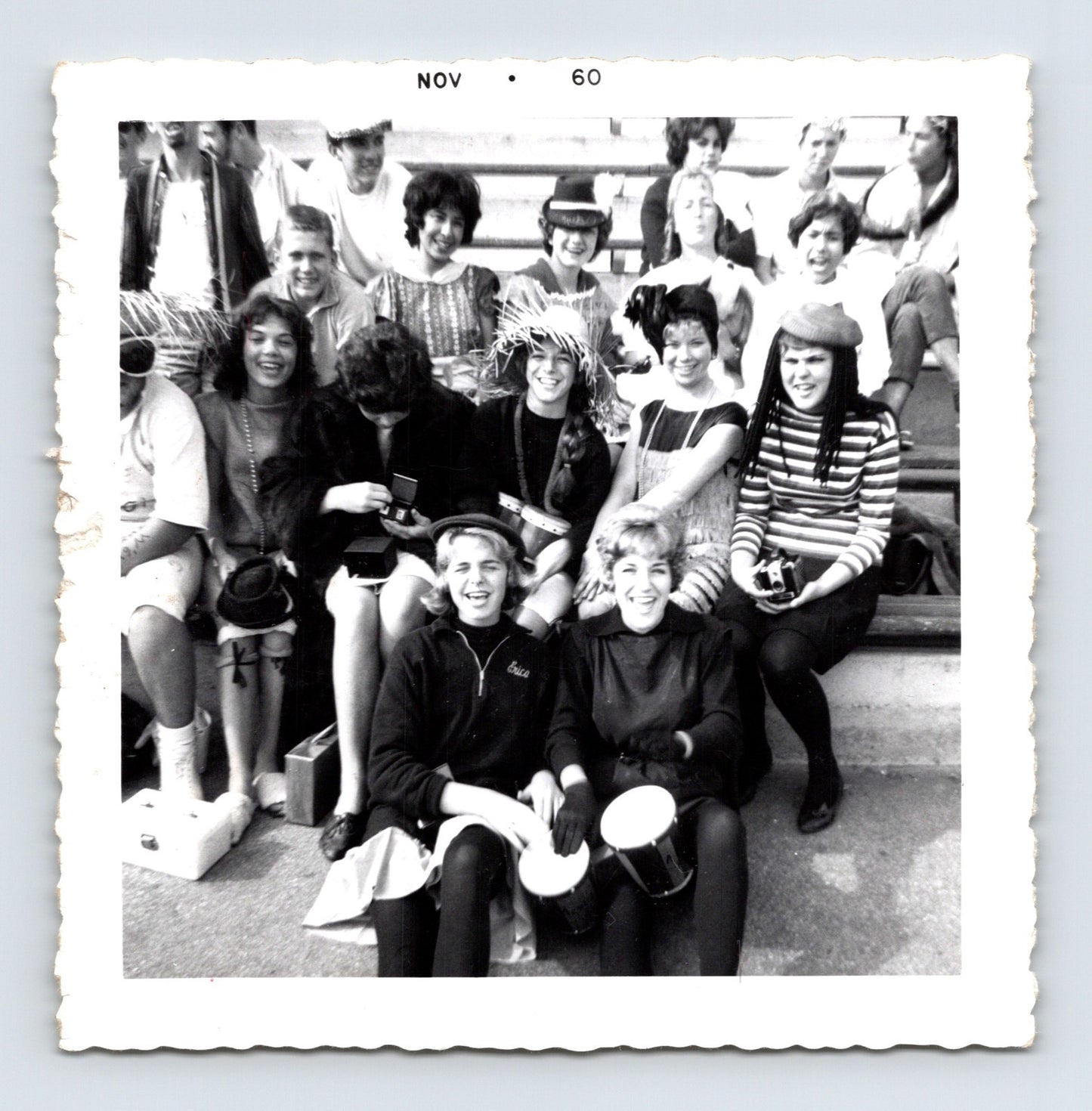 Vintage group teenagers costumes bleachers drums camera 1960 snapshot