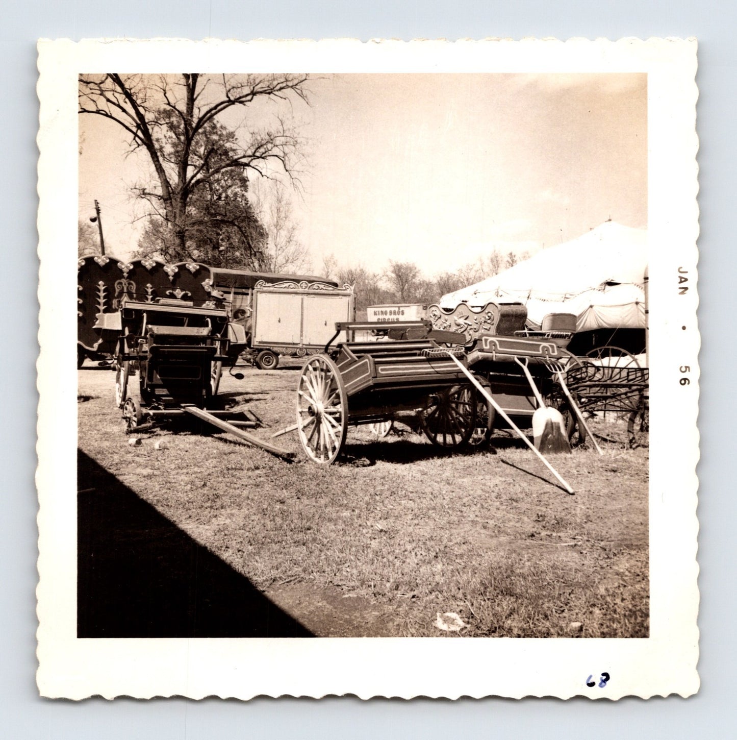King Bros Circus 1956 antique parade wagons equipment lineup tent background photo