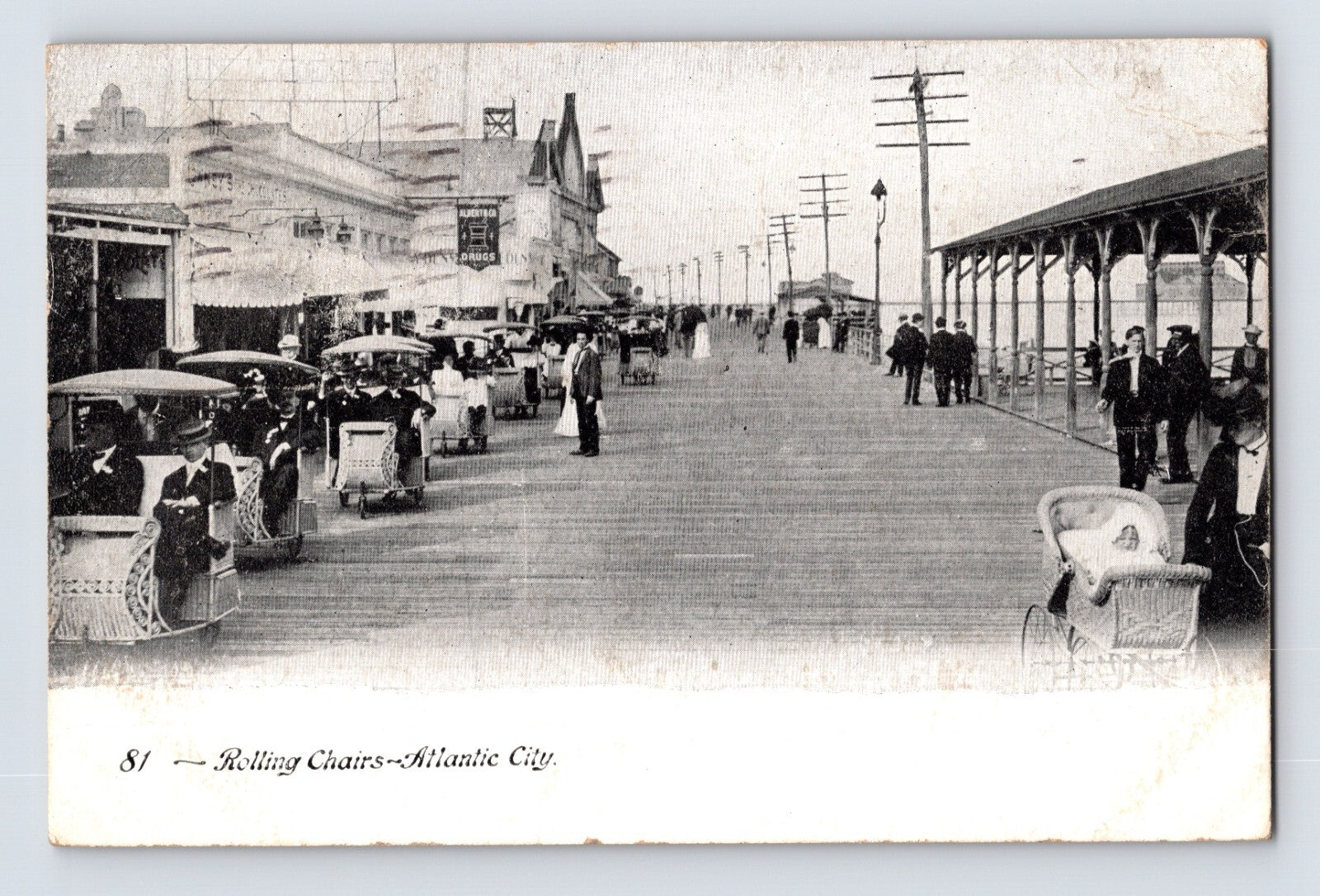 Atlantic City New Jersey boardwalk rolling chairs early automobiles crowd 1910 postcard