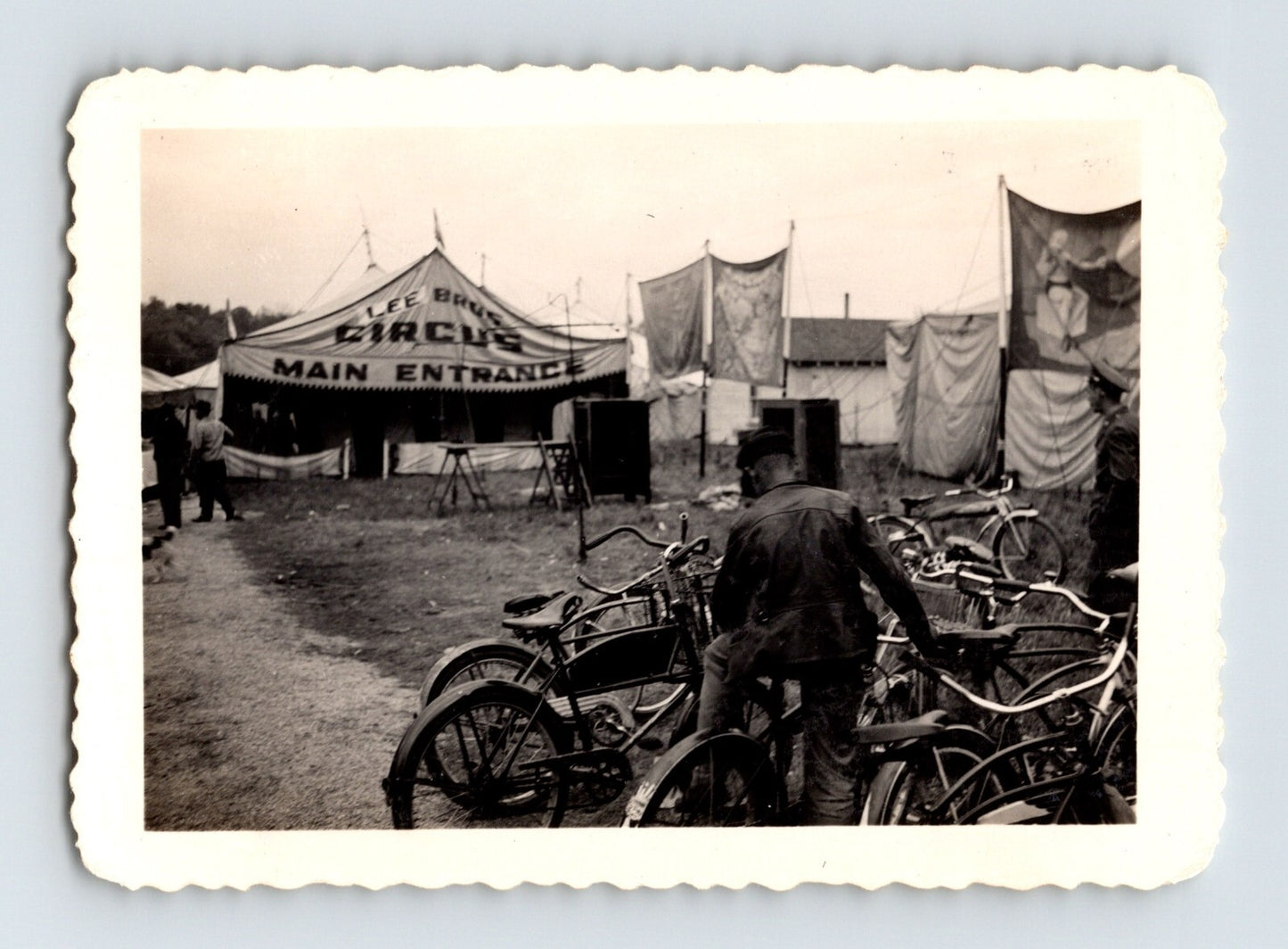 Lee Bros Circus 1943 main entrance tent with bicycles parked in foreground vintage photo