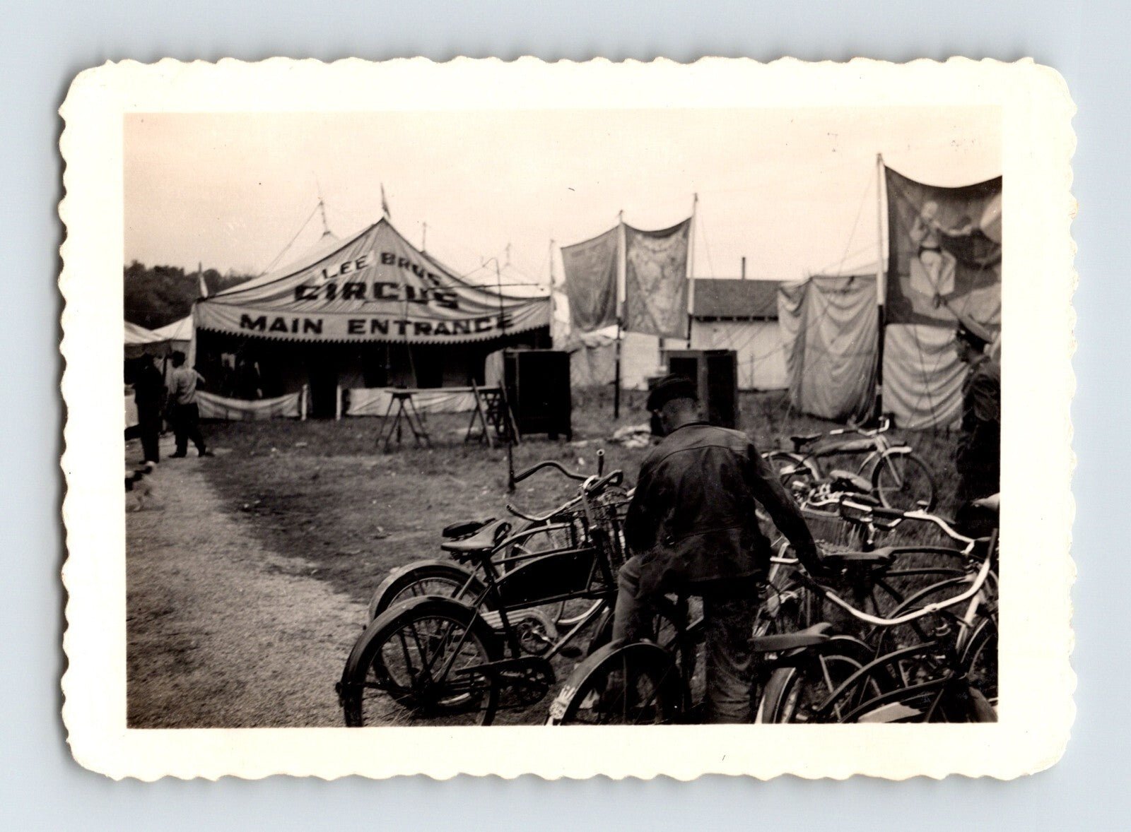Lee Bros Circus 1943 main entrance tent with bicycles parked in foreground vintage photo