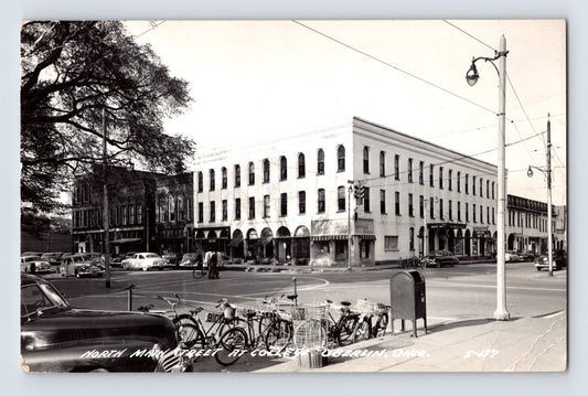 Oberlin Ohio Main Street Oberlin College district Hanson Bakery corner bicycles 1952 RPPC