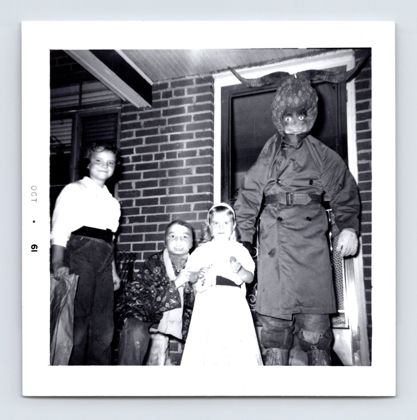 1961 Halloween children costumes horned mask devil figure group porch snapshot square photo