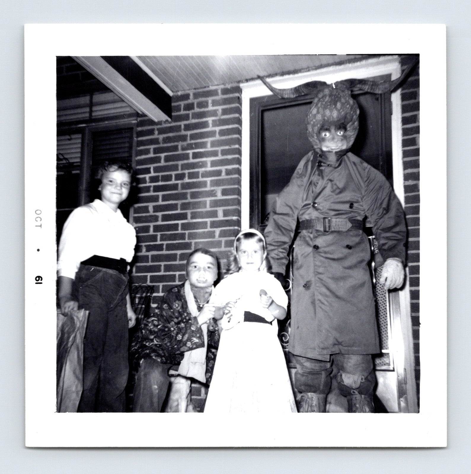 1961 Halloween children costumes horned mask devil figure group porch snapshot square photo