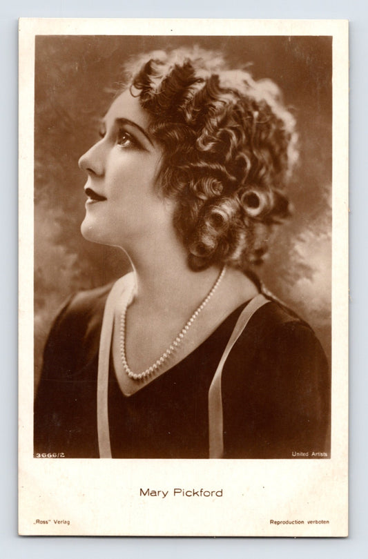 Sepia portrait of Mary Pickford in profile with short curled hair and pearl necklace Ross Verlag photo postcard