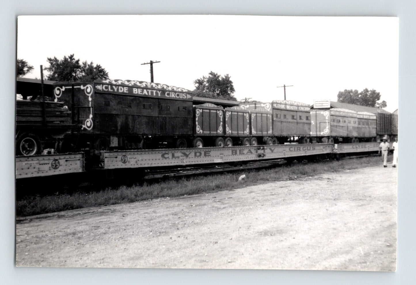 Clyde Beatty Circus train cars loaded on flatcars circus transport railroad 1953 photo