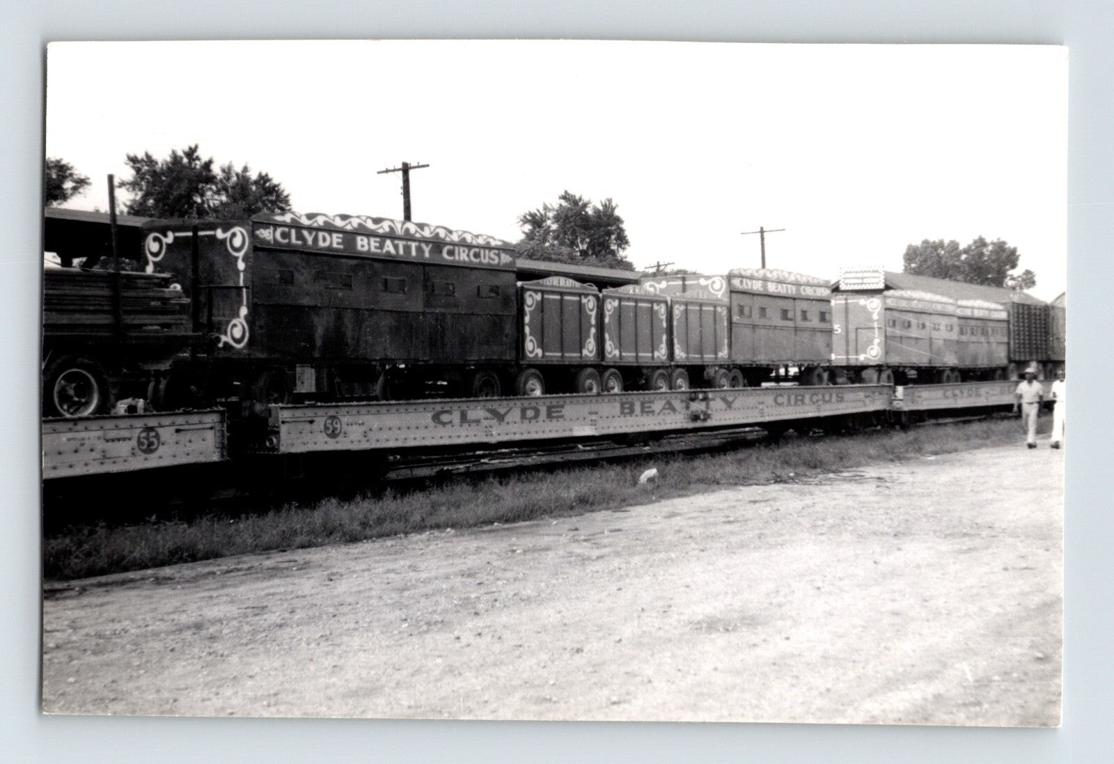 Clyde Beatty Circus train cars loaded on flatcars circus transport railroad 1953 photo