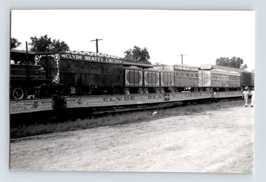 Clyde Beatty Circus train cars loaded on flatcars circus transport railroad 1953 photo