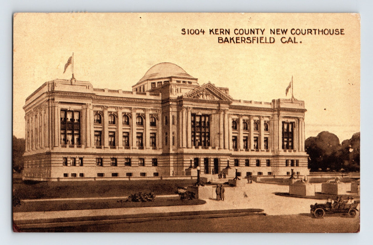 Bakersfield California Kern County courthouse 1913 postcard with neoclassical building and early automobiles