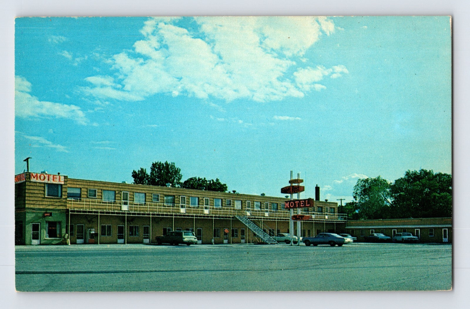 Front image alt text: Missoula Montana Green's Sweet Rest Motel 1960s chrome postcard exterior with roadside sign and parked cars