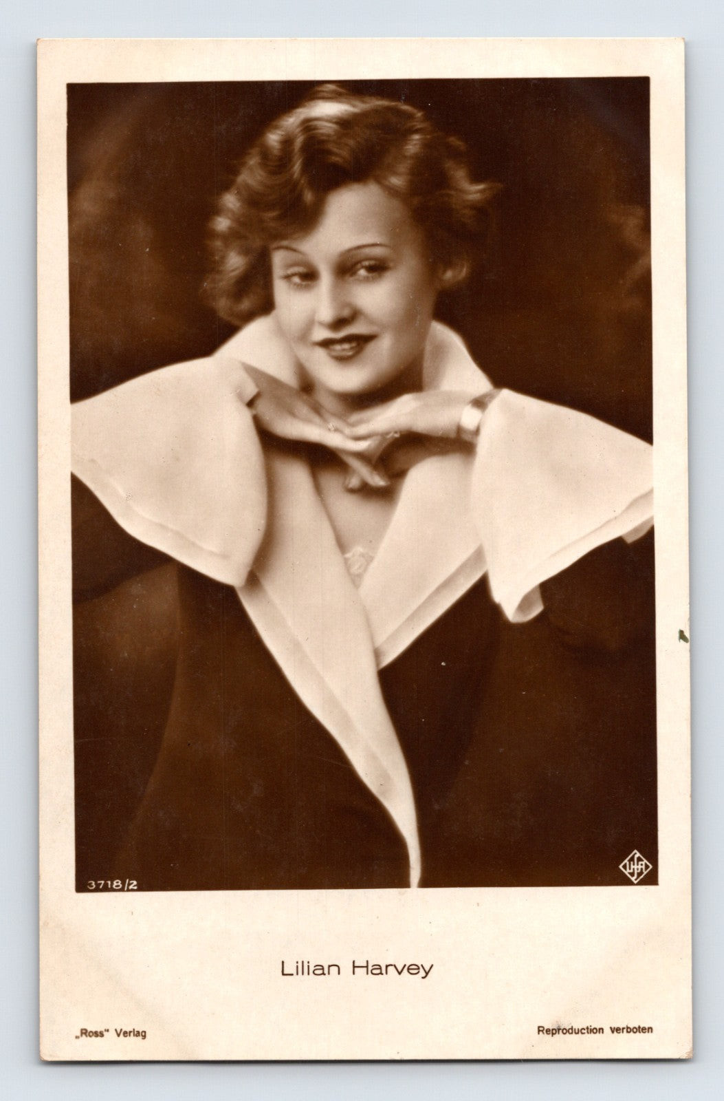 Lilian Harvey studio portrait 1930s Ross Verlag real photo postcard with printed name caption