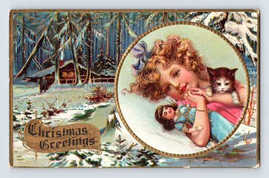 Girl kitten doll snowy cabin 1910s Christmas postcard winter scene