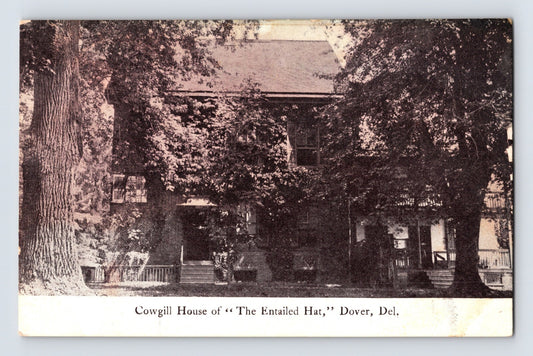 Sepia-tone postcard view of the Cowgill House associated with The Entailed Hat in Dover, Delaware, showing a large historic residence shaded by mature trees.