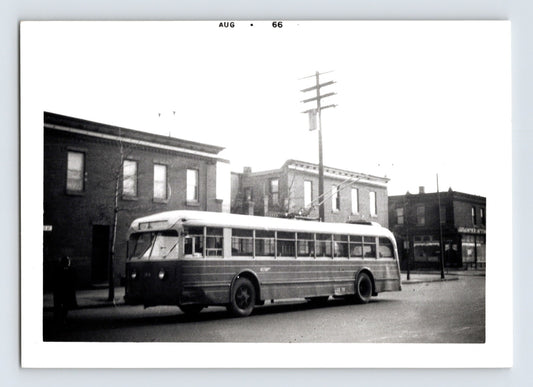 Philadelphia Transportation Company trolley bus street scene August 1966 brick row buildings urban neighborhood