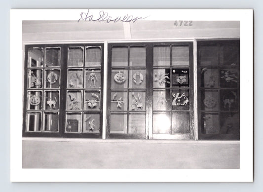 Halloween window display paper decorations skeleton pumpkin witch bats vintage snapshot photo 3.5 x 5