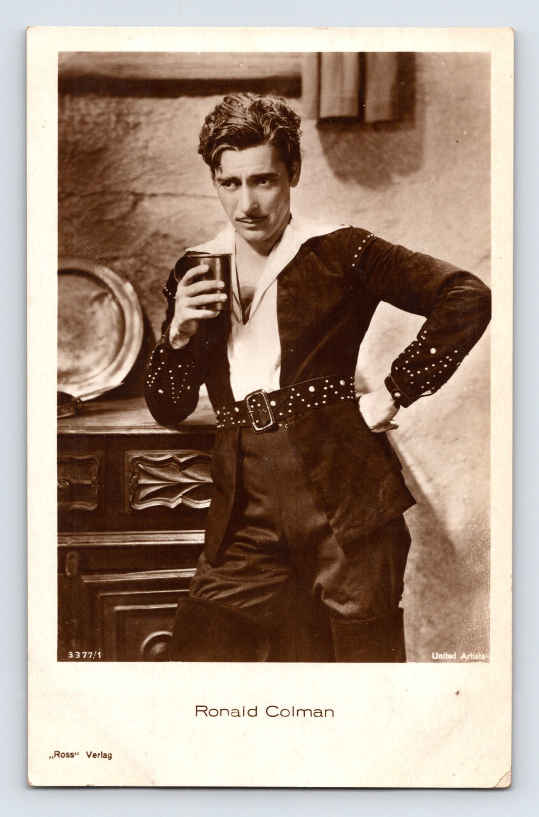 Ronald Colman portrait holding drink Ross Verlag film star postcard
