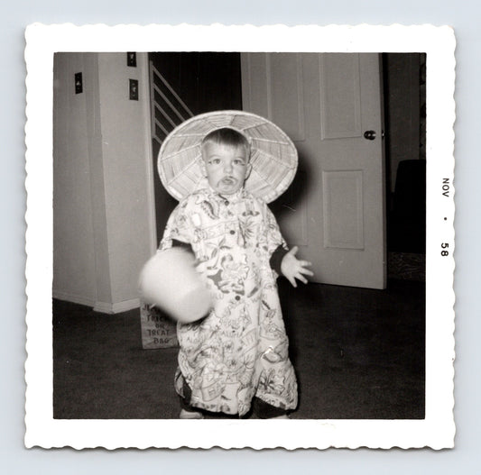 1958 Halloween child costume conical hat trick or treat bag indoor snapshot square photo