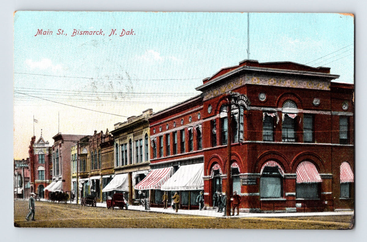 Bismarck North Dakota Main Street downtown storefronts early 1900s horse wagon street scene postcard