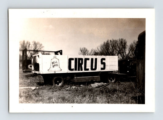 Bell Brothers Circus 1946 truck trailer side panel sign circus equipment field black white photo