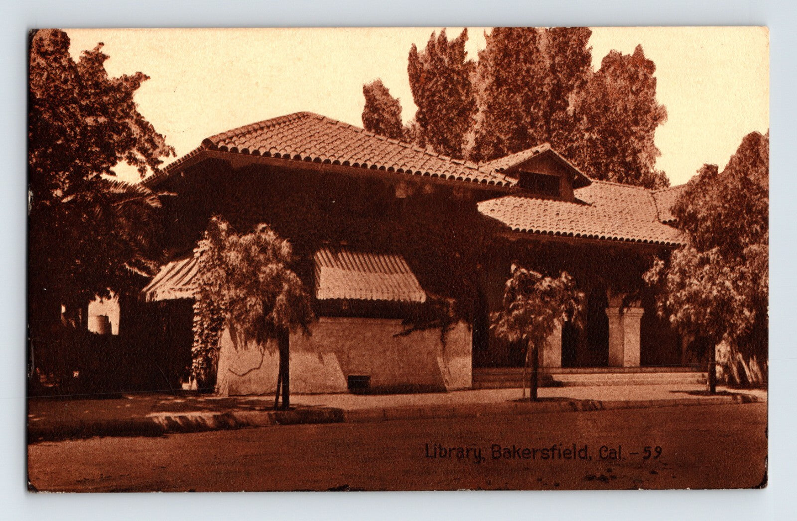 Bakersfield California library building Spanish style tiled roof trees 1910 sepia postcard