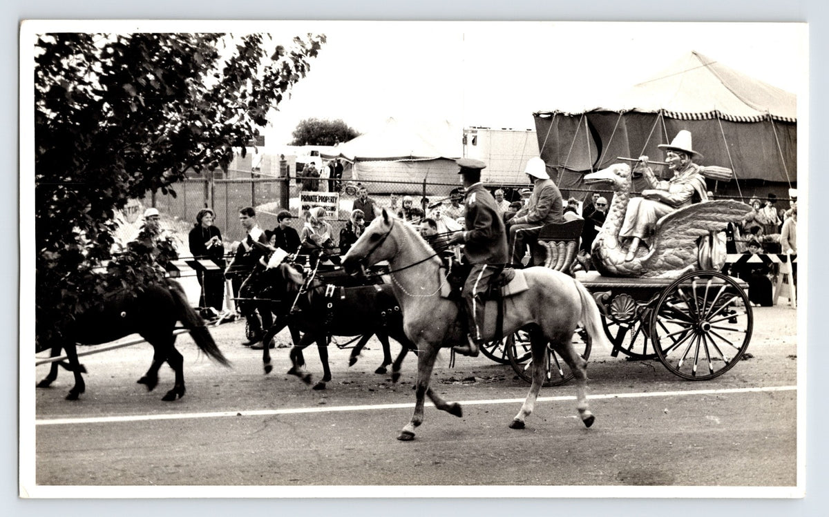 Arthur Bros Circus parade Mother Goose wagon with performer and horses Louisville Kentucky 1967 circus street parade photograph