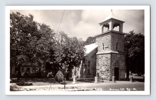 Calistoga California Our Lady of Perpetual Help Catholic Church real photo postcard with stone bell tower dated 1951.