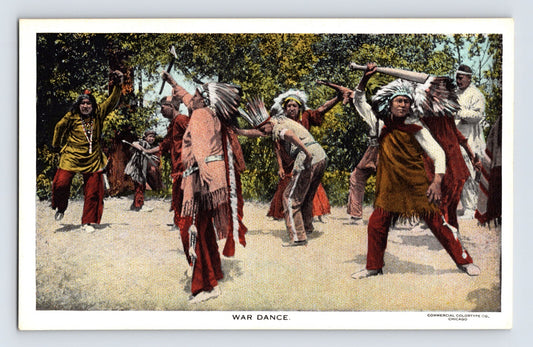 Native American war dance performers feather headdresses postcard