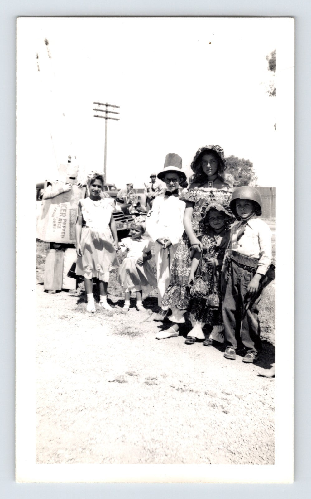 Children Halloween costumes roadside lineup paper bag costume 1950s photo