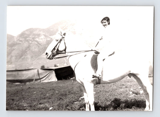 Barnes Sells Floto Circus woman performer Wendy riding horse circus tent lot mountains background 1940s circus photograph