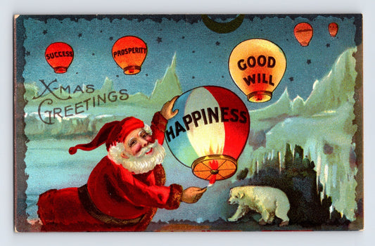 1910s Christmas postcard showing Santa Claus releasing colorful lantern balloons labeled Happiness Good Will Prosperity and Success with polar bear and snowy mountains