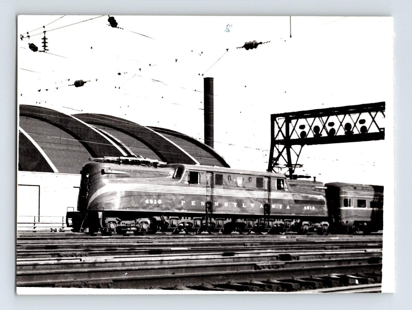 Pennsylvania Railroad GG1 electric locomotive Washington DC rail yard overhead wires vintage train photo
