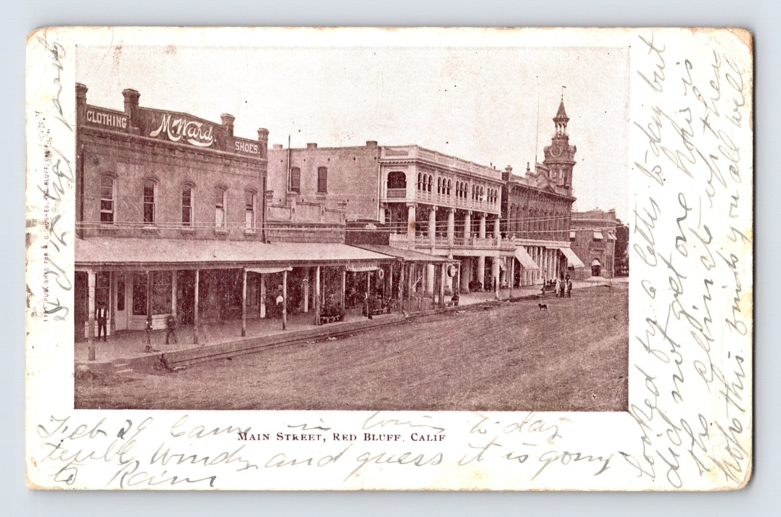 Red Bluff California Main Street postcard showing early downtown storefronts, covered sidewalks, and the Tehama County courthouse clock tower.