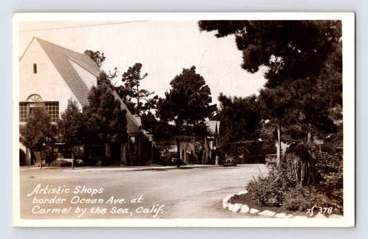 Real photo postcard of artistic shops along Ocean Avenue in Carmel by the Sea California 1938 posted