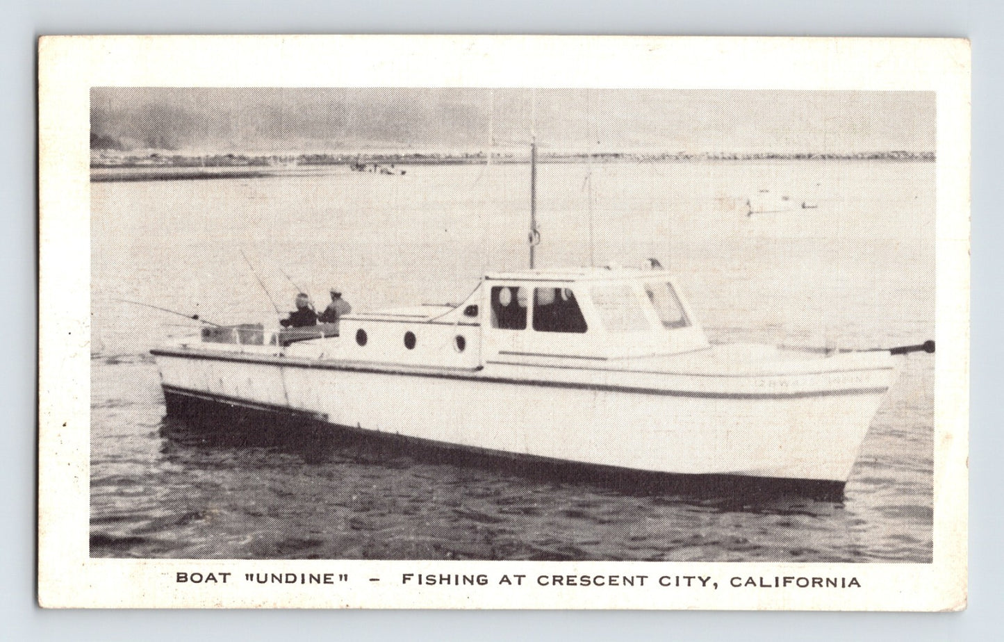 Crescent City California sport fishing boat Undine offshore with anglers on deck 1940s postcard black and white