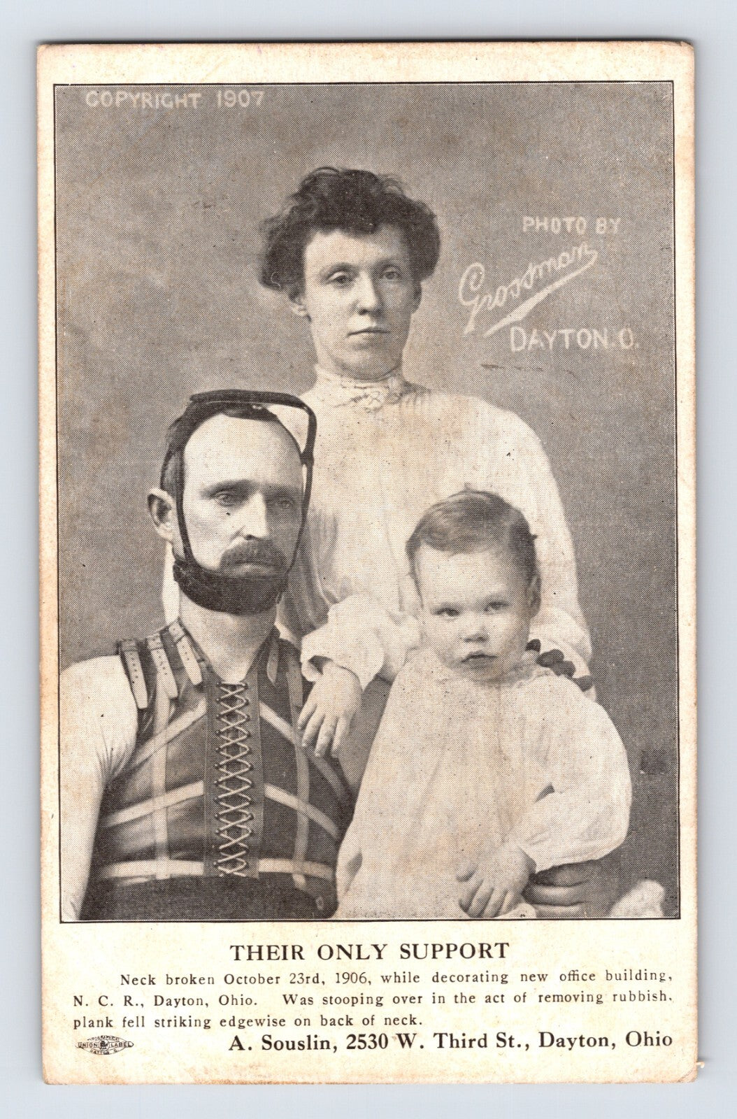 Dayton Ohio NCR employee wearing spinal brace with family medical support postcard