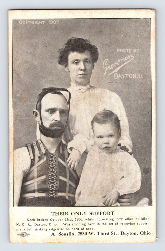 Dayton Ohio NCR employee wearing spinal brace with family medical support postcard