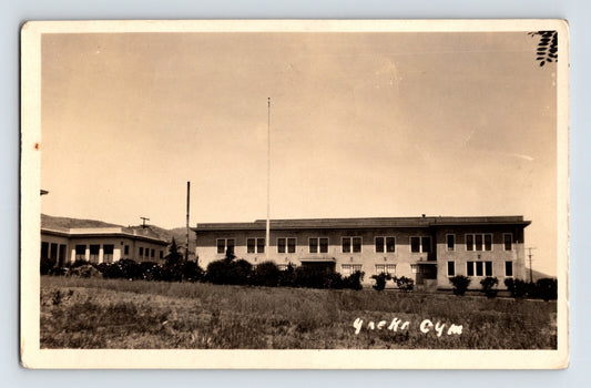 Yreka California school gym recreation center RPPC postcard showing long institutional building on hillside campus