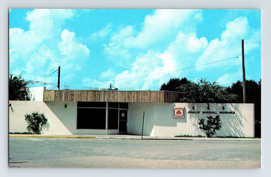 Winter Haven Florida Challis Marshall Insurance office 1990 postcard with modern low building and signage