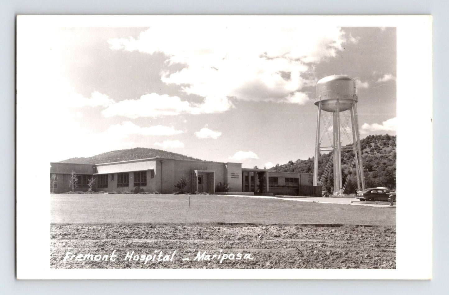 Mariposa California Fremont Hospital building water tower landscape 1950s RPPC postcard